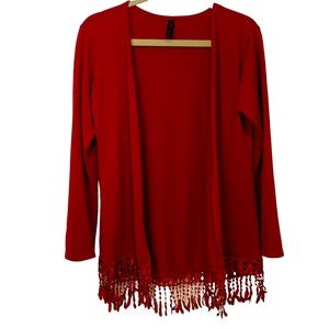 Red cover up/kimono with bottom fringes. It does not have any closures or tags